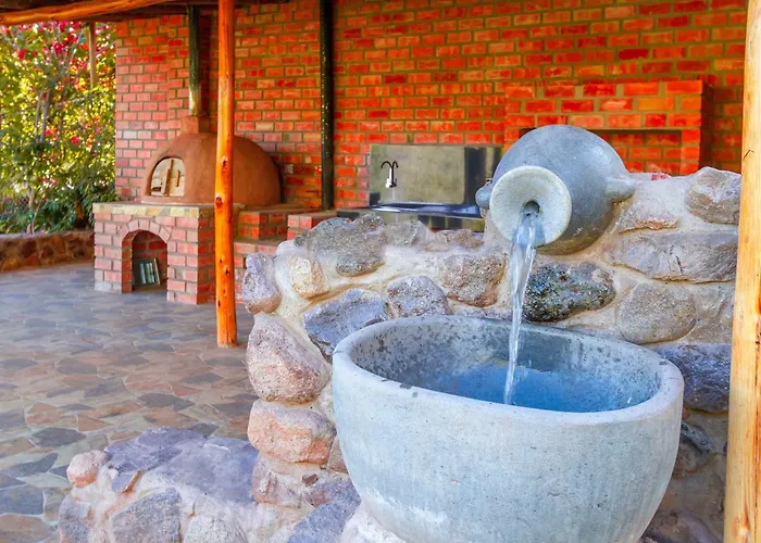 Casa Piscina 23 Pax Wifi Parking ホテル